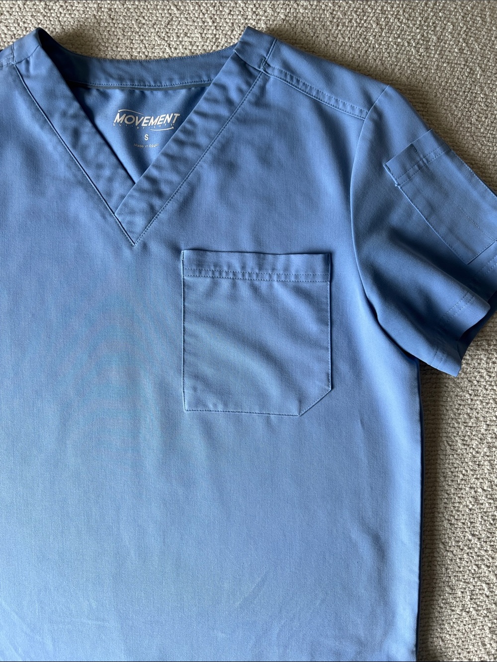 Movement V-Neck Scrub Top in Ceil Blue. Very comfortable.